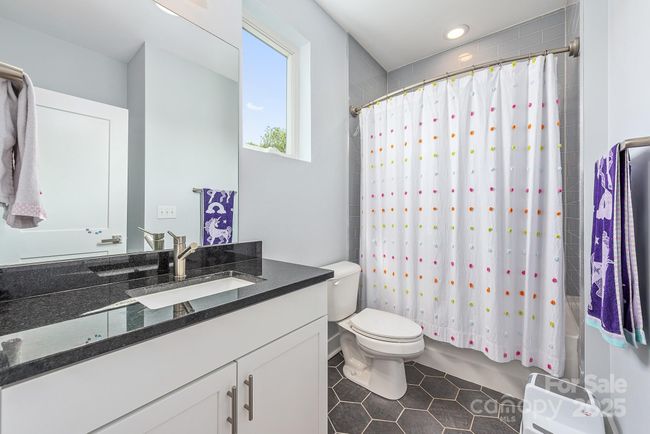Upper level full bathroom | Image 25