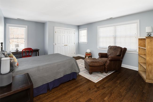 Large Bedroom featuring dark hardwood flooring. | Image 25