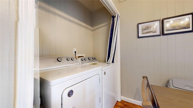 Washer/dryer located off of the kitchen. | Image 10