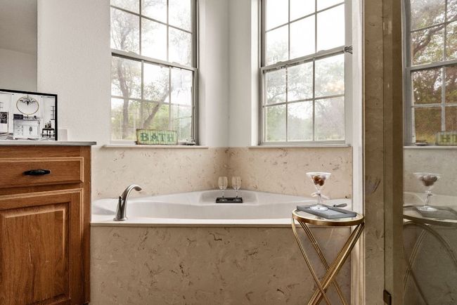 Full bath with vanity and a bath | Image 28
