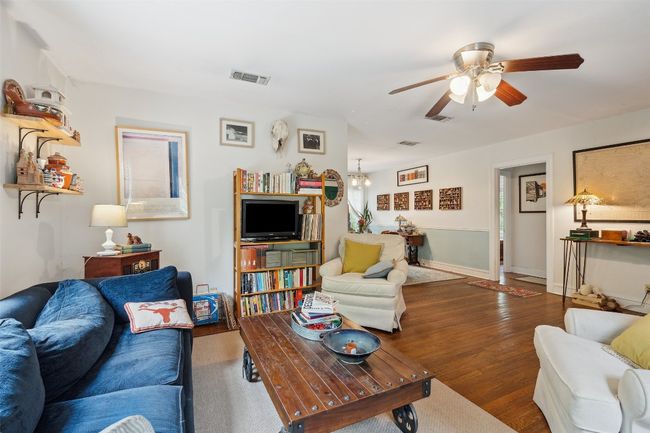 Main living area with original hardwood floors | Image 26