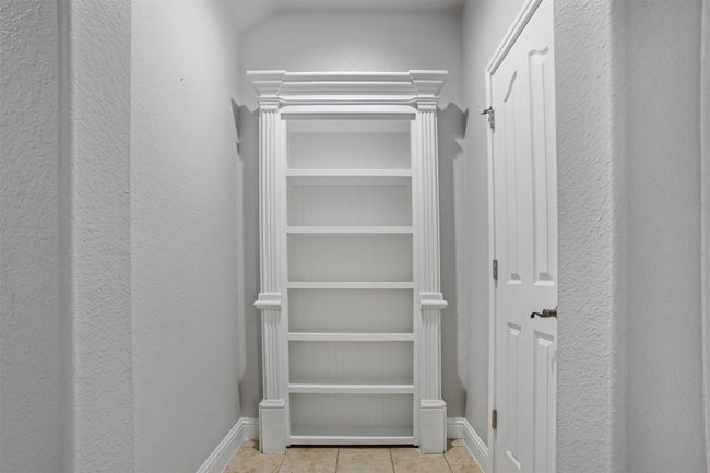 Spacious closet with tile patterned flooring | Image 28