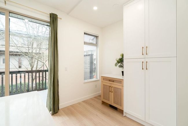 Interior space featuring baseboards, light wood-style flooring, and recessed lighting | Image 7