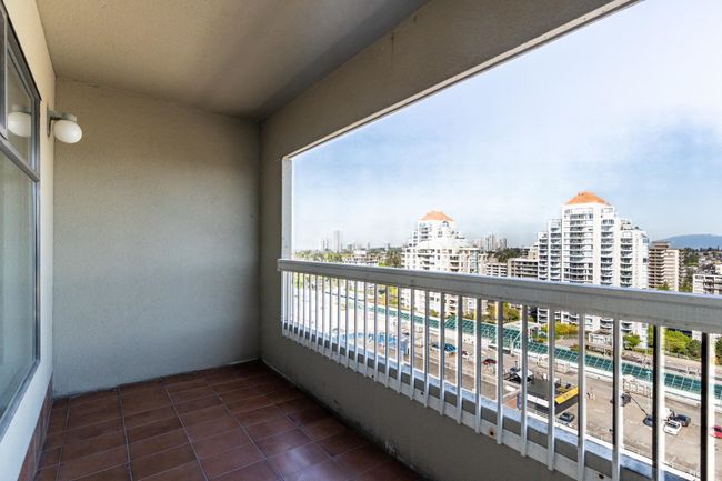Balcony featuring a city view | Image 19