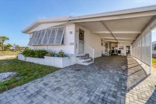 12 Hacienda Dr, ENGLEWOOD, FL, 34223-2140 | Card Image