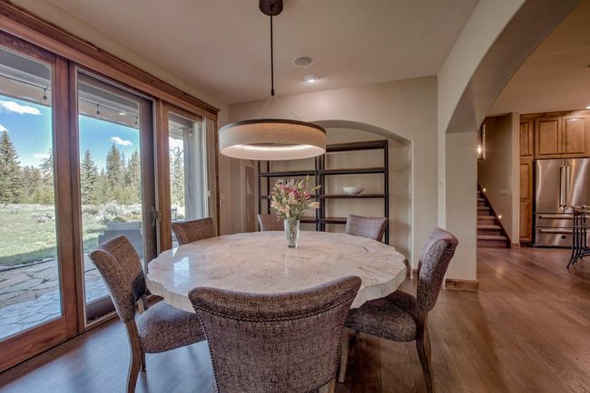 Gorgeous dining space with views into National Forest. | Image 8