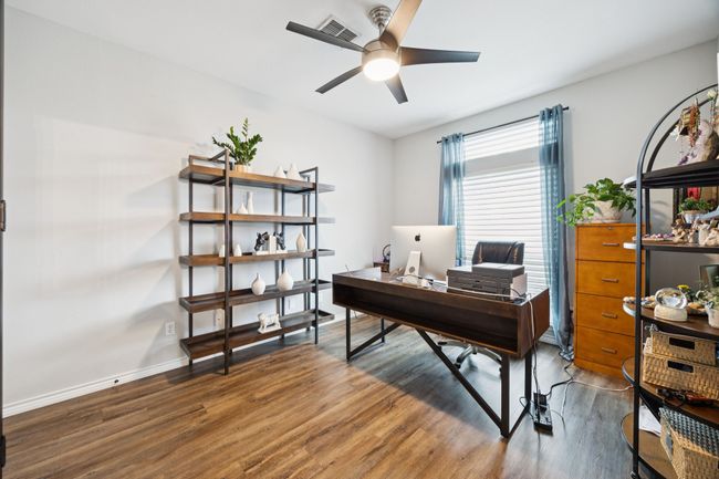Office featuring ceiling fan and wood finished floors and french doors | Image 7