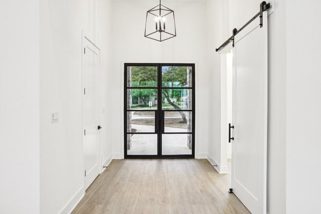 Step into style—this 2022-built home is a stunning blend of clean lines and classic comfort. | Image 11