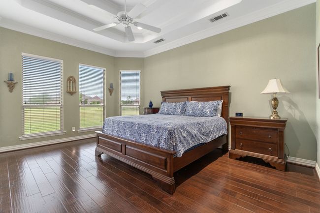 Contrasting paint gives this Primary bedroom the perfect touch! | Image 15