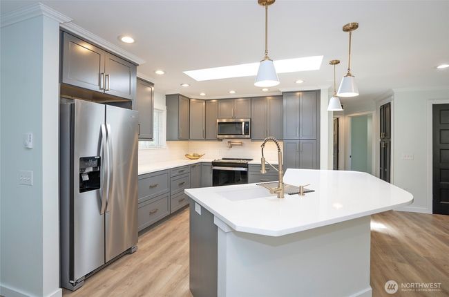 Beautifully updated, extra large kitchen. | Image 8
