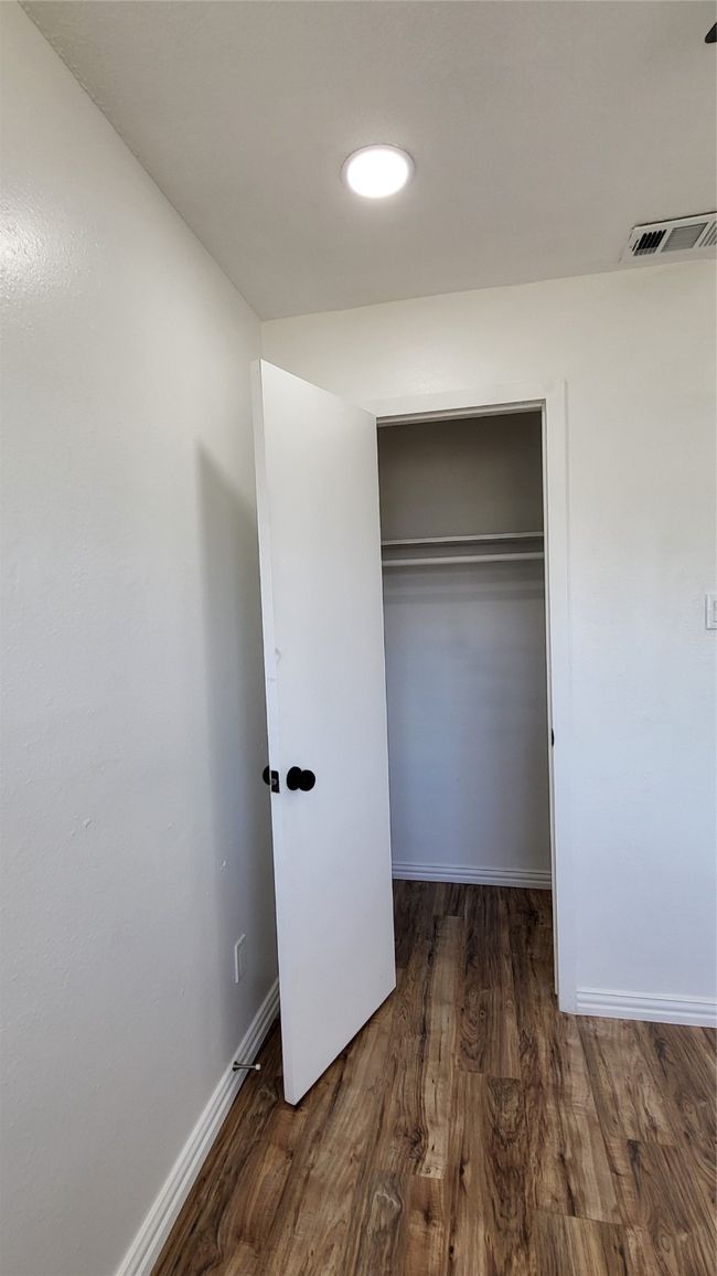 Closet featuring visible vents | Image 28
