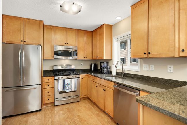 Beautilful maple cabinets and granite countertops | Image 8
