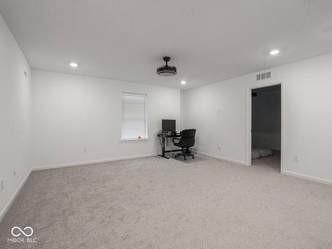 unfurnished office featuring visible vents, baseboards, recessed lighting, and carpet floors | Image 32