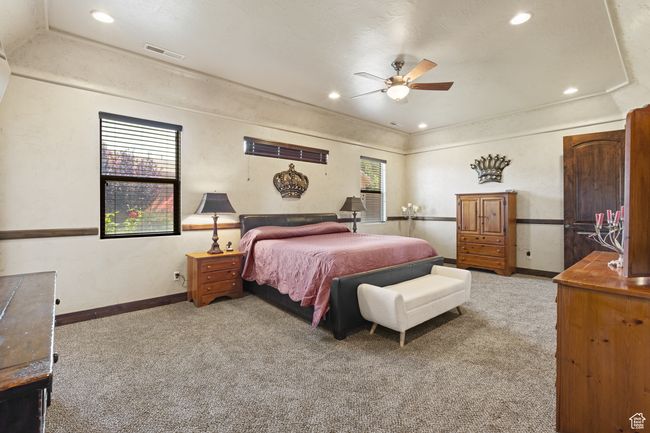 Carpeted bedroom with recessed lighting and ceiling fan | Image 28