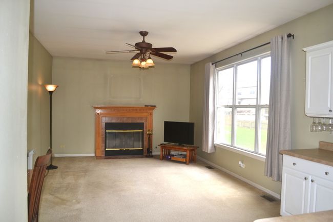 Family Room with gas start fireplace. | Image 9
