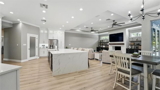 Kitchen open to family room. | Image 9