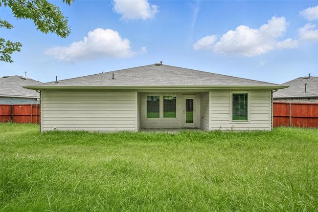 Rear view of property featuring a shingled roof | Image 20
