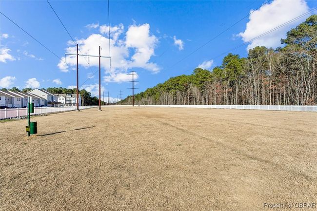 View of property's community featuring fence | Image 29
