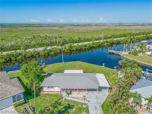 12065 Boat Shell Dr, MATLACHA ISLES, FL, 33991-1627 | Card Image