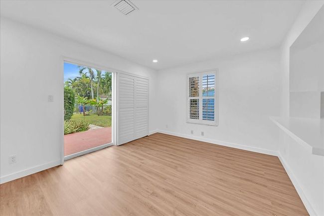 with Pass-Through Bar to Kitchen & Slider to Back Yard | Image 18