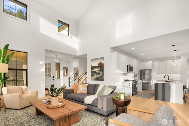 As the newest PNW master-planned community, enjoy 200+ acres of open space, trails & the Coal Trax Mt Bike Park. Soaring ceilings in the great roommake each day worthy of celebration & open floorplan appeals to entertaining. Covered deck & patio. Southern-facing homesites range from the mid600s- 900ks. Enjoy a variety of innovative & distinctive new home options with the best all-season recreation just moments away! Built for the future, indulge in a retreat just 90-min to Seattle. Plans and elevations are artist’s renderings only, may not accurately represent the actual condition of a home asconstructed and may also contain options and upgrades which are not included in the sale. Trailside Homes reserves the right to make changes to the floorplan, specifications, dimensions, design and elevations without prior notice. Stated dimensions and square footage are estimated and should not be usedas representations of the home’s actual size. | Image 12