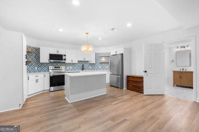315 Trevington Ct, House other with 7 bedrooms, 5 bathrooms and null parking in Alpharetta GA | Image 40