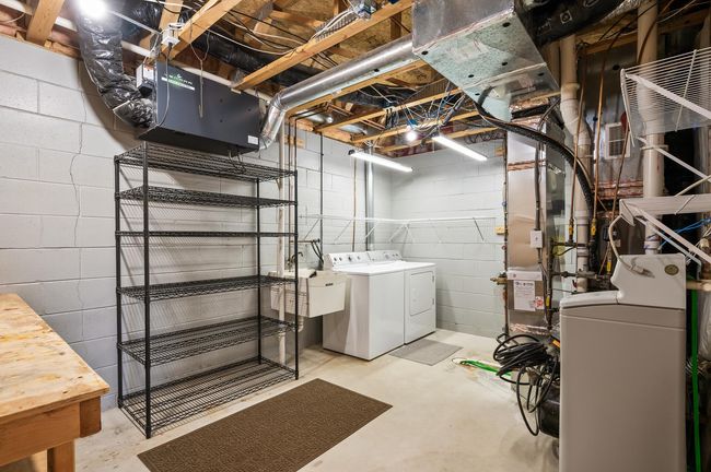 Plenty of room in the laundry and utility room for even more storage! | Image 44
