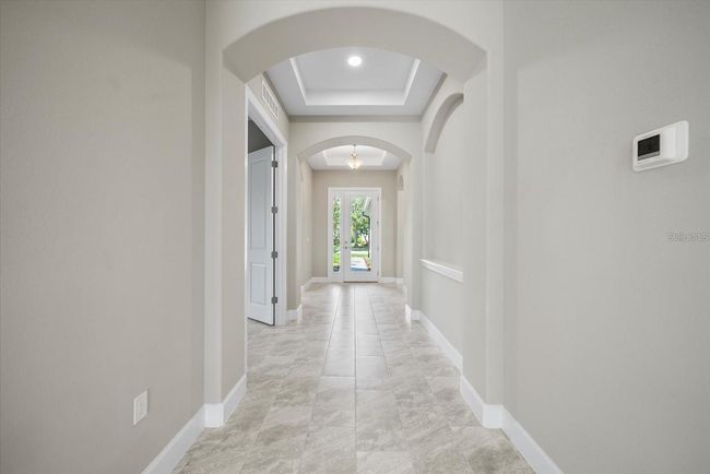 Long hallway to front entrance view | Image 10