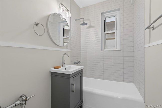 Full bath with shower / washtub combination and vanity | Image 9