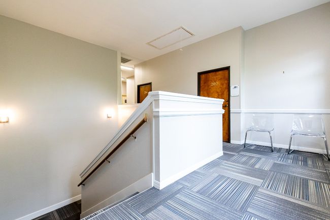 Stairway with baseboards and carpet | Image 9