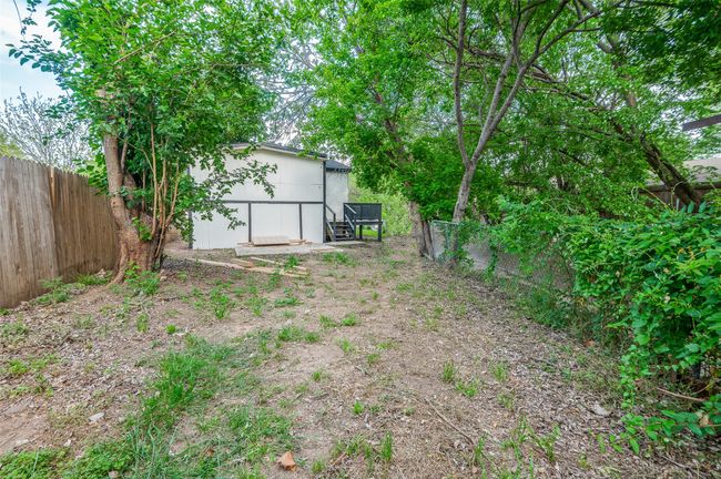 View of yard with a fenced backyard | Image 23