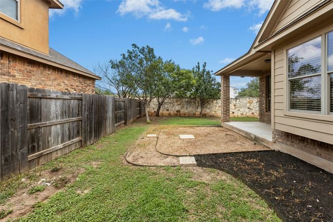 View of yard featuring a patio | Image 32