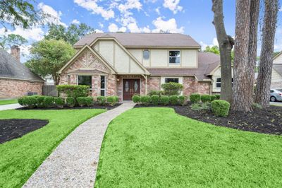 Curb appeal with mature trees. | Image 1