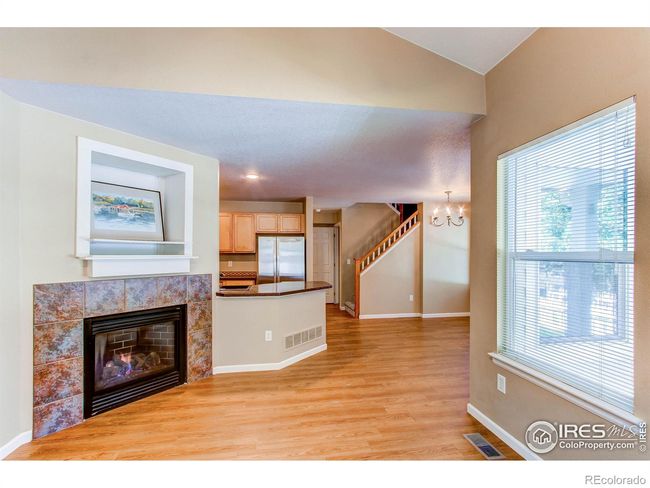 Open floor plan seamlessly blends the great room, kitchen, and dining area | Image 4