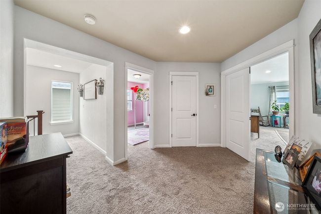 Open landing at top of staircase doesn't cramp this area into a small hallway. | Image 15