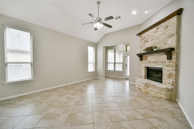 This home has a true split floorplan with the owners suite privately tucked away from the rest of the home. It is just around the corner from the back patio door. | Image 14