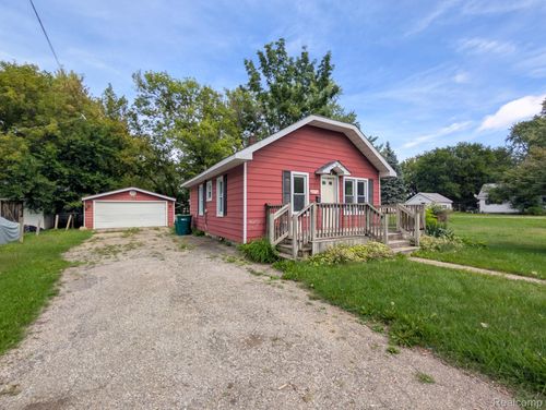 635 Spruce St, Mount Morris, MI, 48458-1942 | Card Image