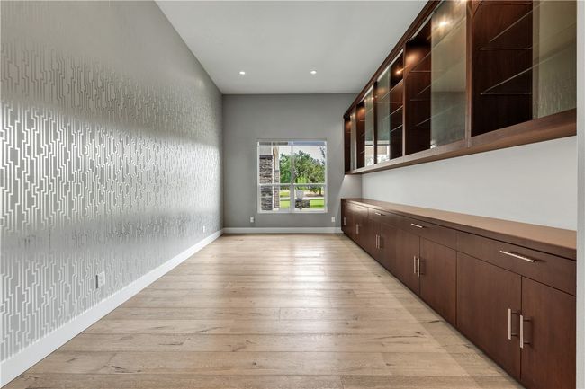 Unfurnished room with light wood-style floors and recessed lighting | Image 13