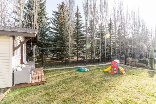 136 Crystal Green Drive, Home with 4 bedrooms, 3 bathrooms and 4 parking in Okotoks AB | Image 38