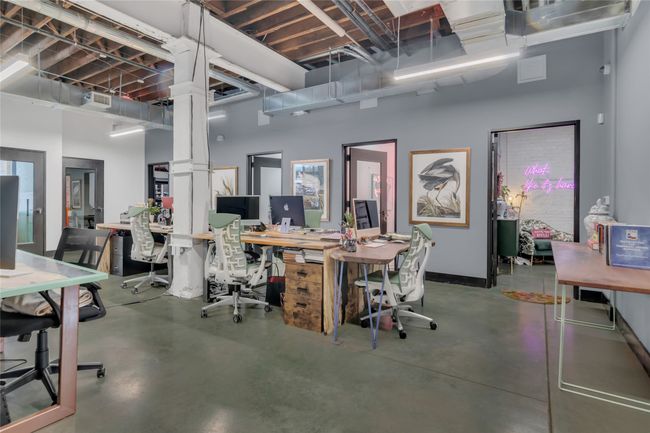 Office area featuring finished concrete floors | Image 15