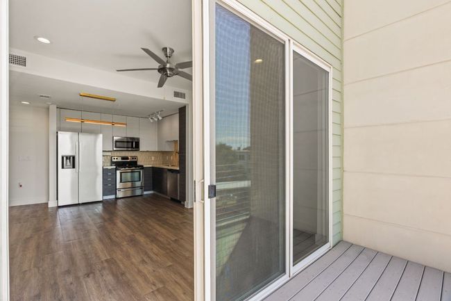 Step out to the balcony, a perfect spot for a small garden, potted flowers, or morning coffee. | Image 18