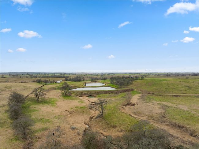 Birds eye view of property featuring a water view and a rural view | Image 4