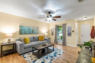 Living room featuring hardwood / wood-style floors | Image 3