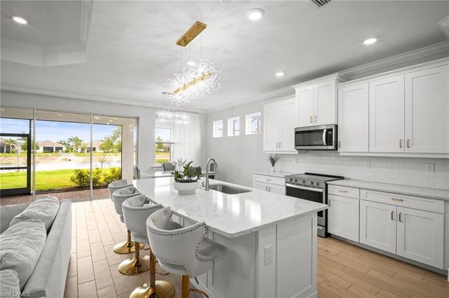 28041 Captiva Shell Loop, House other with 3 bedrooms, 4 bathrooms and 3 parking in BONITA SPRINGS FL | Image 7