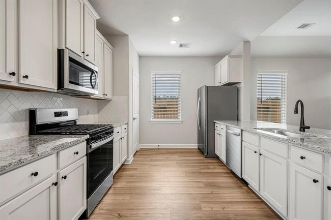 15683 Honey Cove Dr, House other with 4 bedrooms, 2 bathrooms and 2 parking in Conroe TX | Image 7