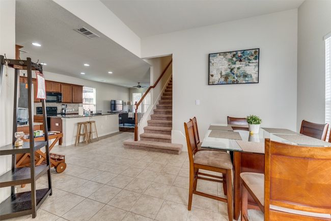 As one enters the home, the dining area is also enhanced with abundant natural light making the house have the feel of home. | Image 8