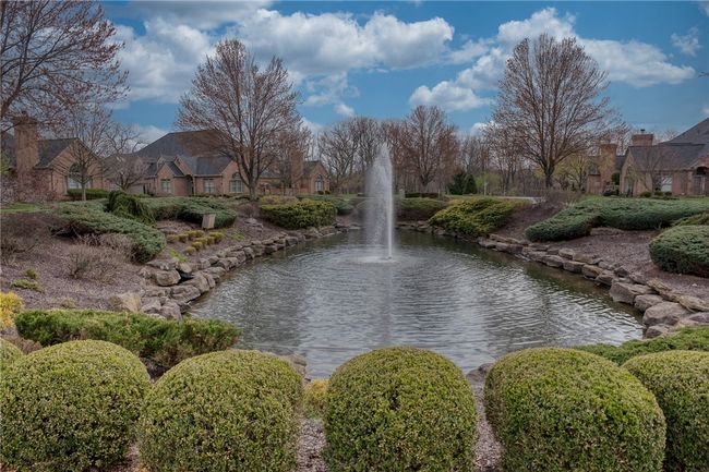 fountain in common area in center of neighborhood | Image 8