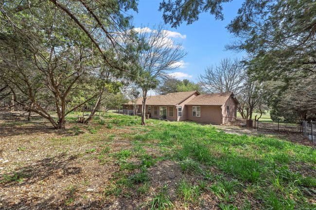 View of yard with fence | Image 24
