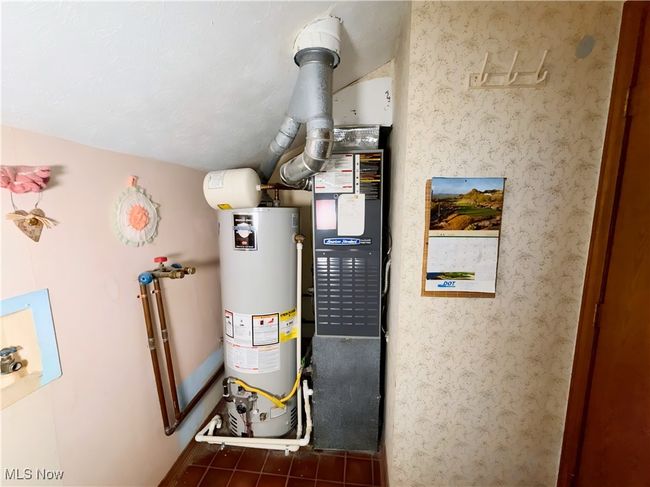 Utilities with gas water heater | Image 11