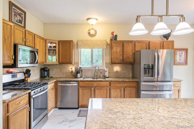 Updated kitchen with new flooring | Image 6